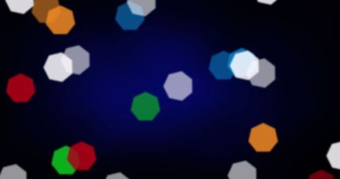 Vibrant Polygonal Bokeh Shapes on Dark Background