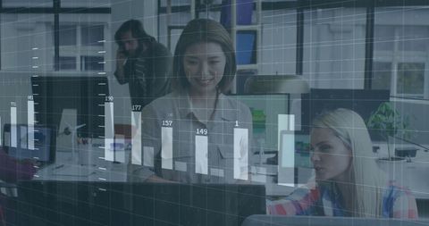 Financial Team Analyzing Data in Modern Office Environment