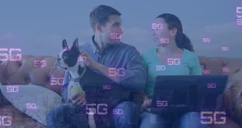 5G Network Connection with Couple and Dog at Home with Laptop
