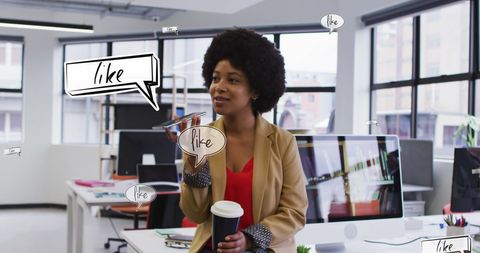 Businesswoman Engaging in Digital Communication in Modern Office