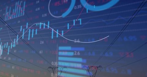 Dusk power transmission overlay showing candlestick charts, analytics gauges, energy grid