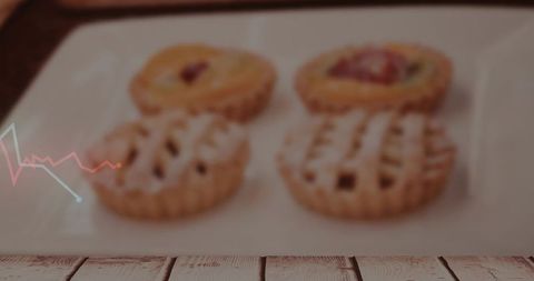 Mini fruit tarts on rustic wood plank with powdered sugar and subtle line graphic overlay