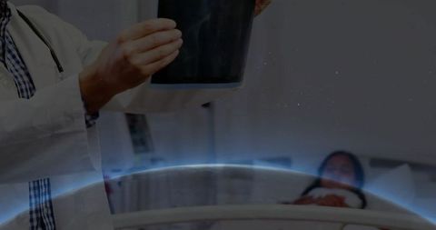 Doctor analyzing x-ray in pediatric healthcare setting