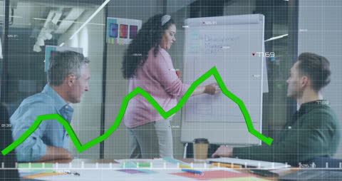 Diverse Business Team Analyzing Data Trends in Modern Office