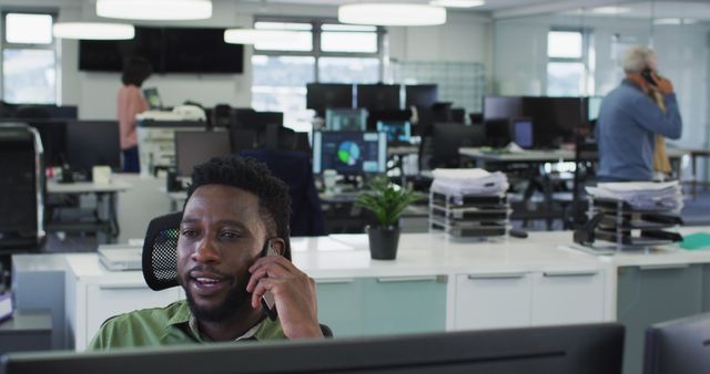 Businessman Talking on Phone in Modern Office Environment - Download Free Stock Images Pikwizard.com