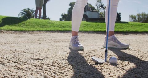 Female Golfers in Bunker Preparing for Shot - Download Free Stock Images Pikwizard.com
