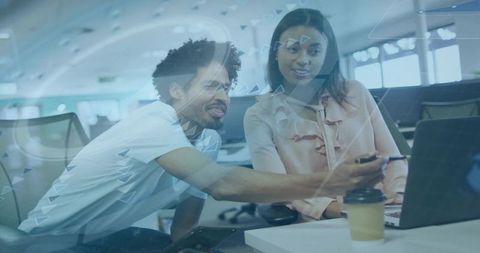 Pointing coworker and teammate viewing laptop collaborating in open office with hud overlay