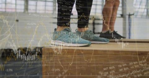 Dynamic fitness partners balancing in studio with custom chart overlay