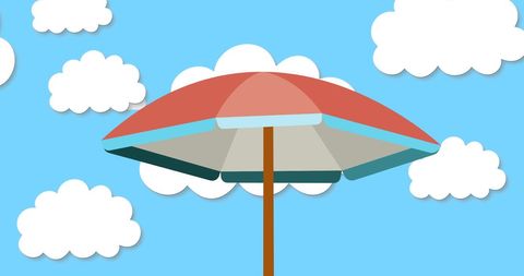 Colorful Beach Umbrella Under Blue Sky With White Clouds