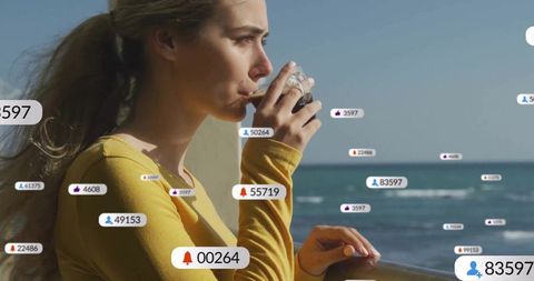 Woman Enjoying Ocean View with Social Media Notifications Overlay