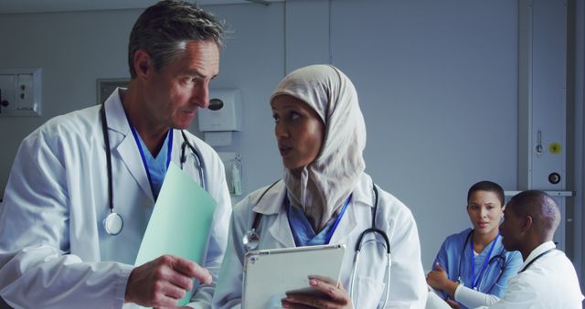 Diverse Medical Team Collaborating in Hospital - Download Free Stock Images Pikwizard.com