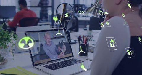 Businesswoman Engaging in Virtual Meeting with Eco-Friendly Focus