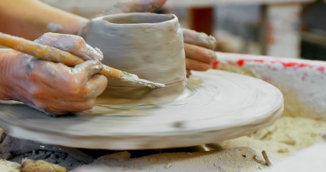 Potter Creating Ceramic Pot on Spinning Wheel - Download Free Stock Images Pikwizard.com