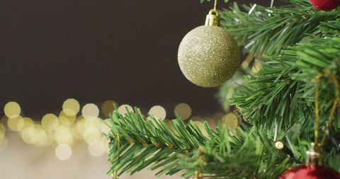 Christmas Tree with Sparkling Baubles and Lit Background - Download Free Stock Images Pikwizard.com