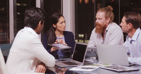 Diverse Business Team Engaging in Discussive Brainstorming Meeting