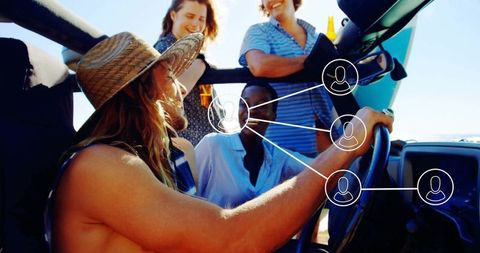 Group of Friends Enjoying Beach Road Trip with Offroad Vehicle