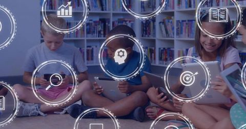 Diverse children sitting in library tapping tablets, edtech hud icons showing learning progress