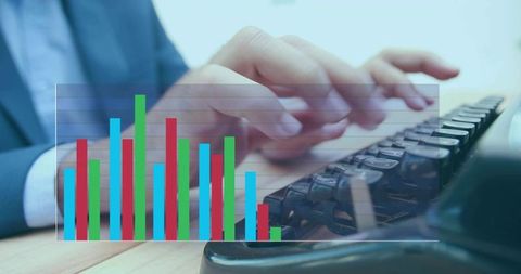 Typing business data on keyboard with colorful bar chart overlay for finance analytics