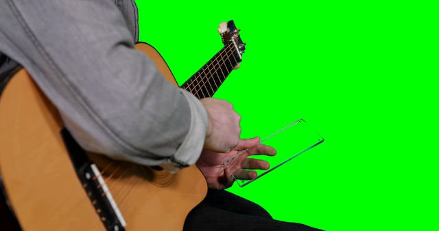 Person Holding Smartphone and Playing Acoustic Guitar - Download Free Stock Images Pikwizard.com