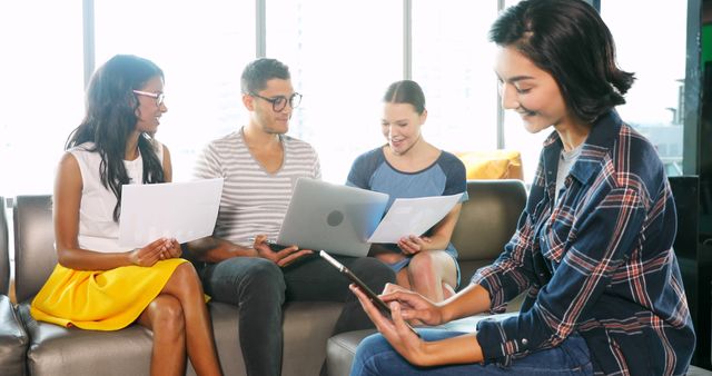 Diverse Students Collaborating on a Relaxed Study Session - Download Free Stock Images Pikwizard.com