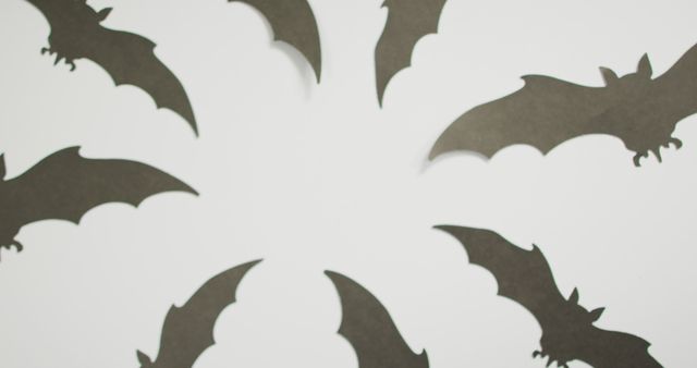 Digital image of multiple halloween bat icons against grey background. halloween holiday and celebration concept