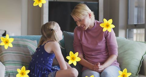 Mother and daughter bonding with floral touches at home