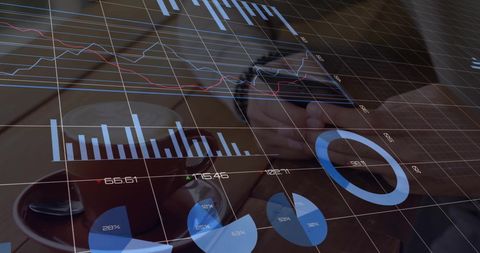 Businessman Analyzing Financial Data with Overlay Charts