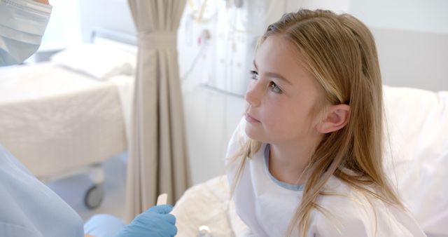 Female Pediatrician Checking Young Patient's Throat in Hospital - Download Free Stock Images Pikwizard.com