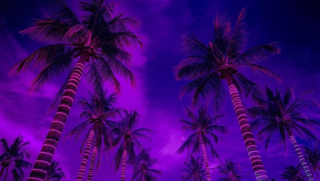 Illuminated palm trees with magic purple sky and clouds
