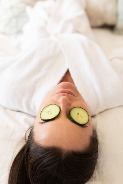 Woman Relaxing with Cucumber Slices on Eyes at Spa - Download Free Stock Photos Pikwizard.com