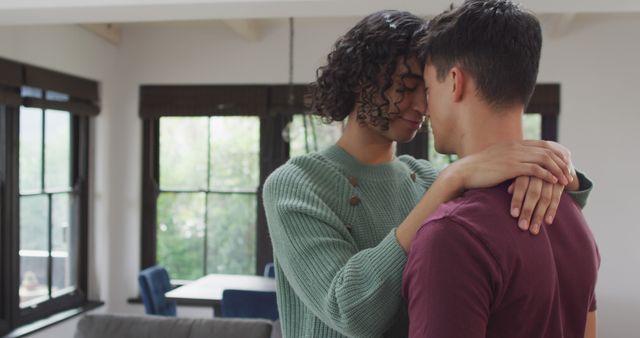 Tender Moment Between Two Young Men in Cozy Home Interior - Download Free Stock Images Pikwizard.com