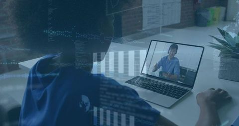 Woman attending virtual meeting on laptop with HUD data overlays on home workspace for teamwork