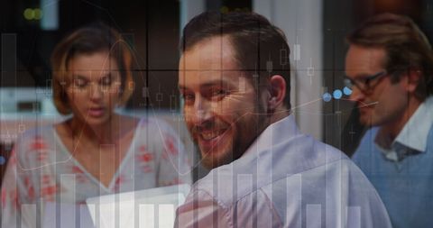 Candid Team Collaboration in Modern Office with Digital Interface