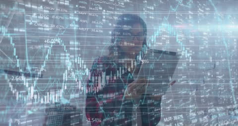 Businesswoman Analyzing Data with Virtual Financial Graphs