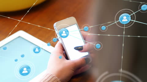 Networking Icons Over Man Engaging with Smartphone