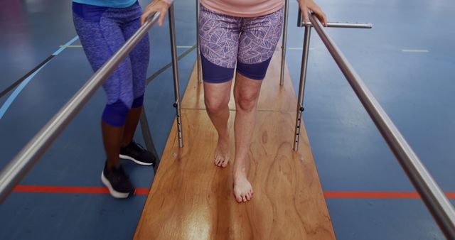 Supportive Physical Therapy Session With Balance Bars - Download Free Stock Images Pikwizard.com