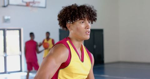 Focused Athlete on Basketball Court Preparing for Game - Download Free Stock Images Pikwizard.com
