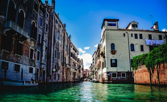 Perfect for travel blogs, websites, and posters promoting Venice or Italian vacations. Highlights Venice's iconic canals and historic architecture, suitable for articles on European destinations or study of urban waterways.