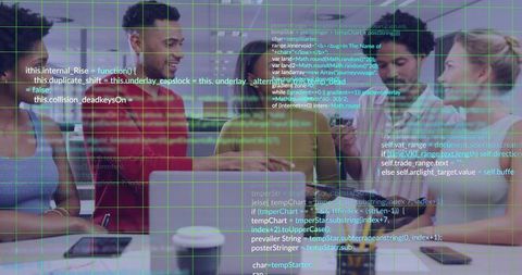 Collaborating tech team leaning over laptop with translucent code overlay in modern coworking space
