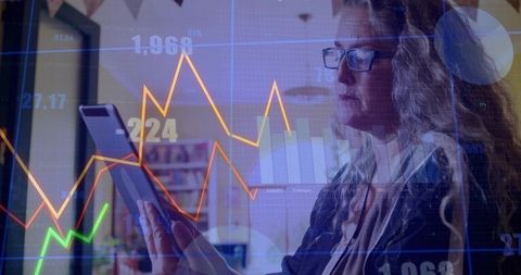 Businesswoman Analyzing Data on Tablet with Financial Chart Overlay