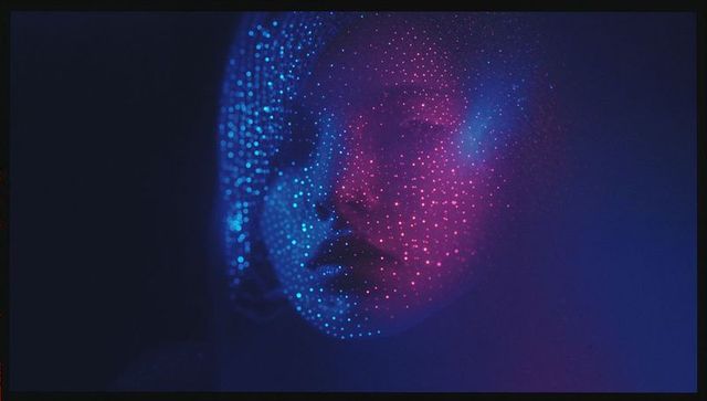 Abstract Portrait with Blue and Magenta Dots and Digital Effect