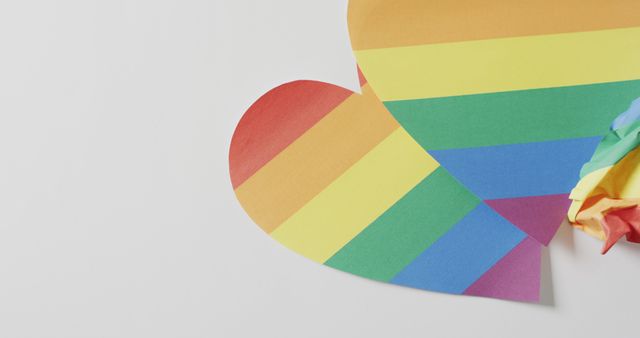 Image of rainbow hearts over white surface with copy space. Gender, lgbt, queer, gay pride and equality concept.