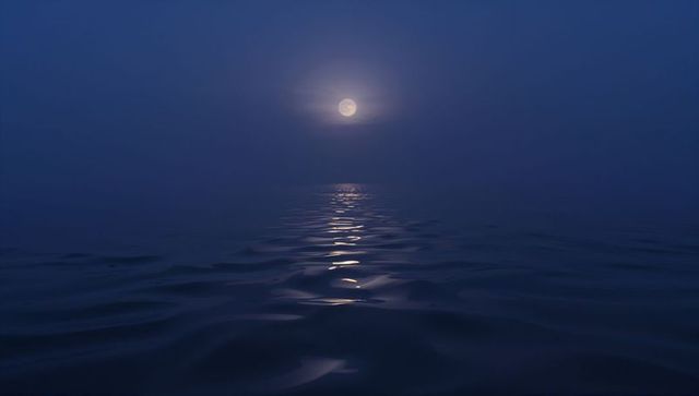 Full Moon Reflecting Over Calm Ocean with Halo and Misty Horizon at Night, Peaceful Seascape