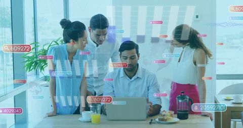 Diverse Team Collaborating in Modern Office with Digital Data Visualization
