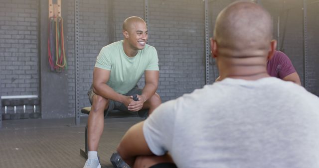 Group of Diverse Men Conversing in Gym Setting - Download Free Stock Images Pikwizard.com