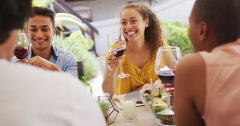 Diverse Friends Enjoying Wine and Conversation at Outdoor Gathering - Download Free Stock Images Pikwizard.com