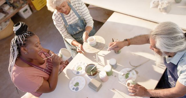 Creative Seniors Taking Pottery Class at Arts Studio - Download Free Stock Images Pikwizard.com