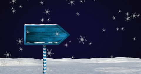 Winter Night Scene with Empty Wooden Sign in Snow