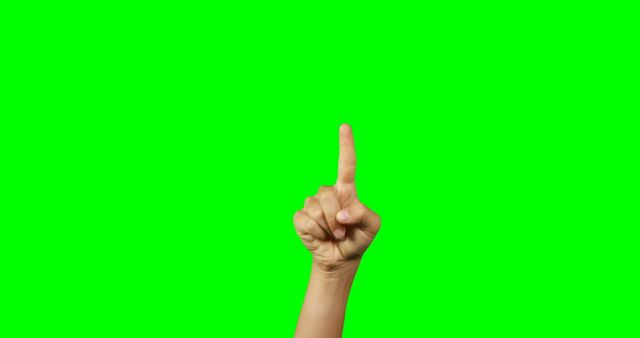 Hand Pointing Upward with Raised Index Finger on Green Background - Download Free Stock Images Pikwizard.com