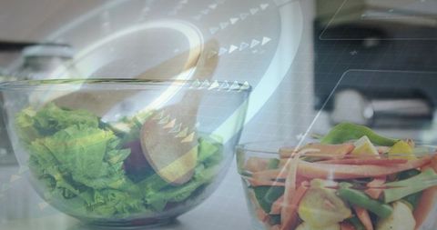 Augmented reality cooking showing fresh salad preparation with glass bowls and spoon